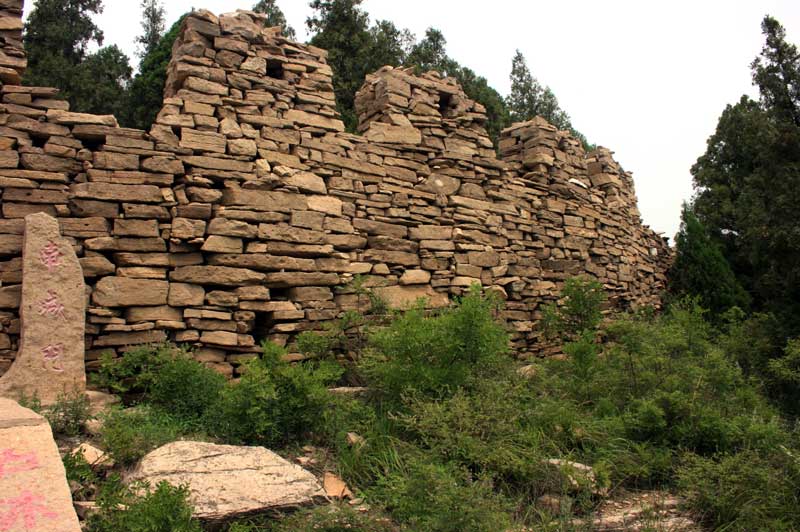 A section of the Great Wall of Qi made of stacked stones.